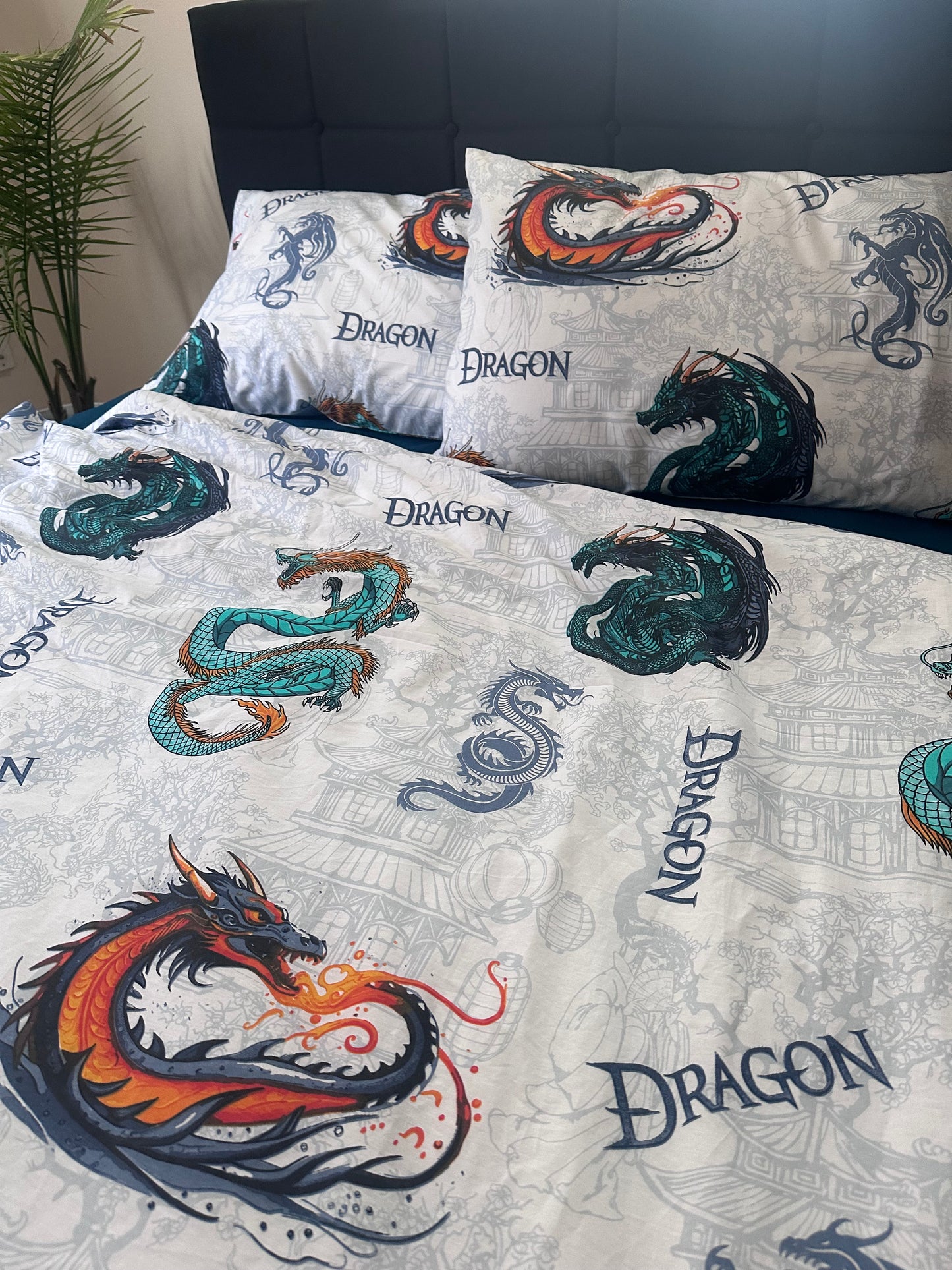 Close-up of dragon embroidery on organic cotton fabric