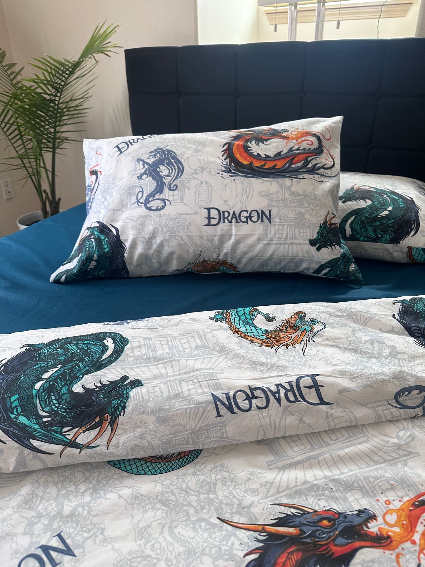 Close-up of dragon embroidery on organic cotton fabric