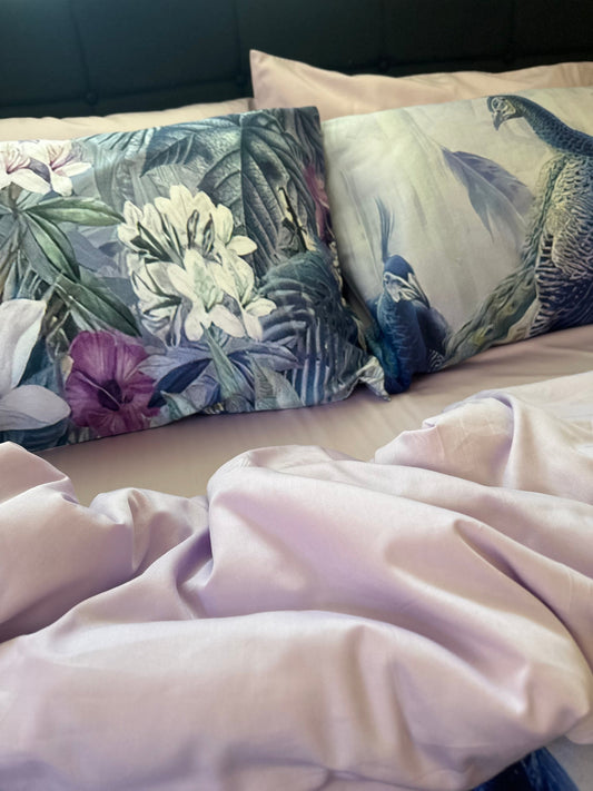 Close-up of silky floral patterned bedding fabric