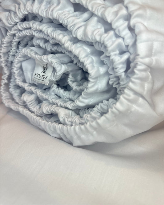Premium Turkish cotton white fitted sheet close-up