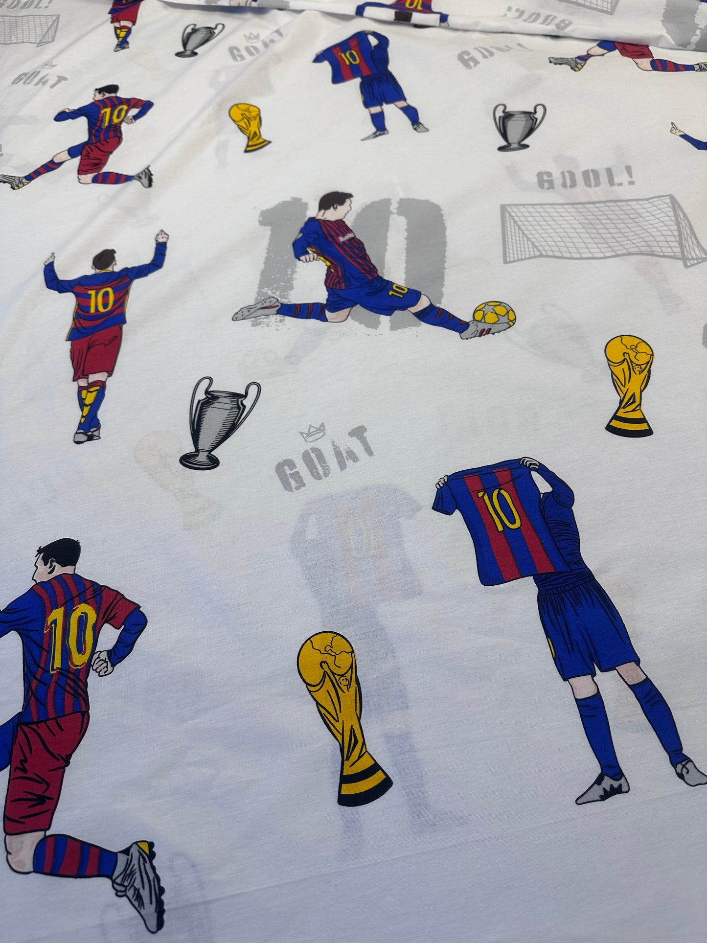 Blue and white football-themed bed set with Messi prints
