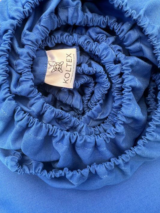 OEKO-TEX® certified blue bedding on white background