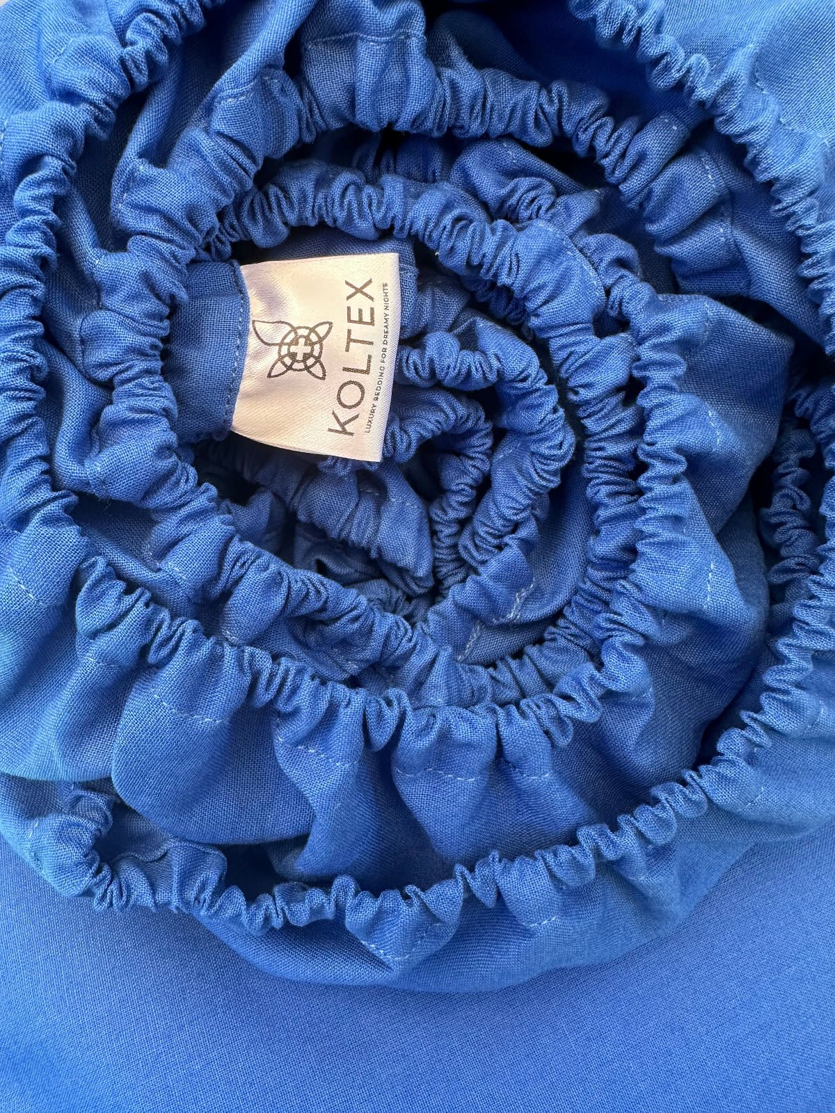 OEKO-TEX® certified blue bedding on white background