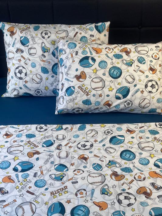 Boys bedroom pillowcases with football and sports ball design