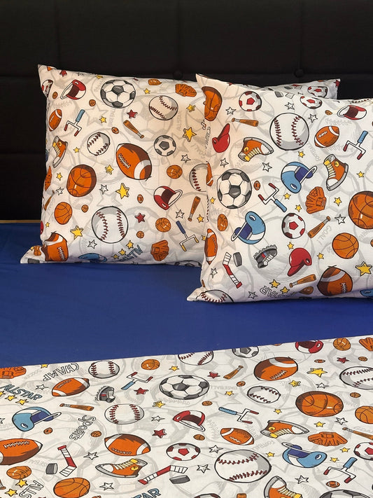 Sports bedding set and pillowcases for kids featuring colorful athletic ball design