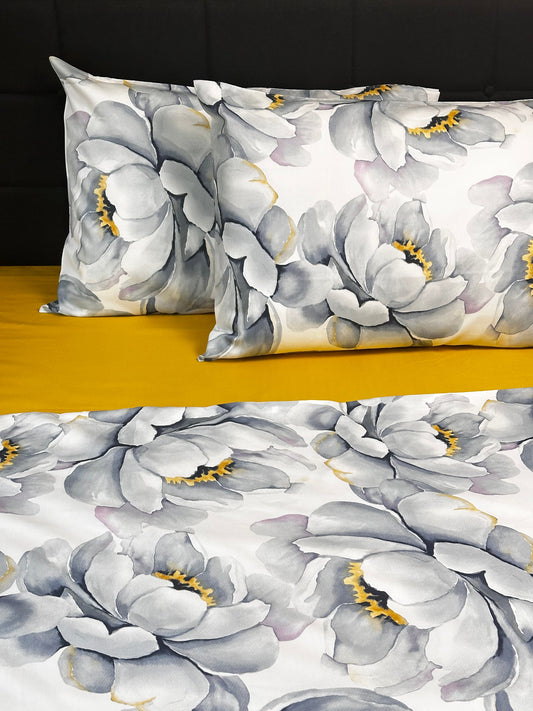 Floral duvet cover and pillowcases set with large gray watercolor peony flowers on a white background.