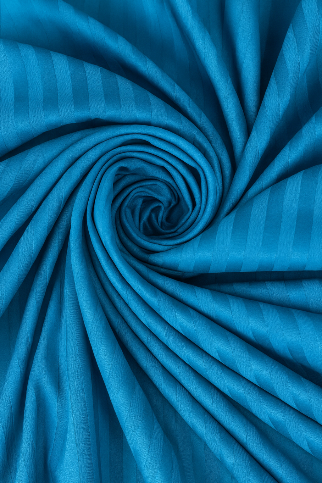 Blue fabric with striped pattern, tightly rolled up