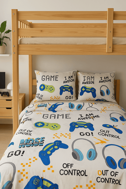 Organic cotton video game bedding set displayed on a child’s twin bed with a gamer controller print