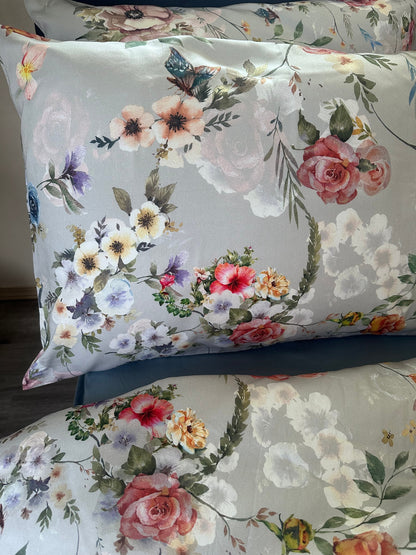 Close-up of smooth sateen bedding with vibrant floral designs