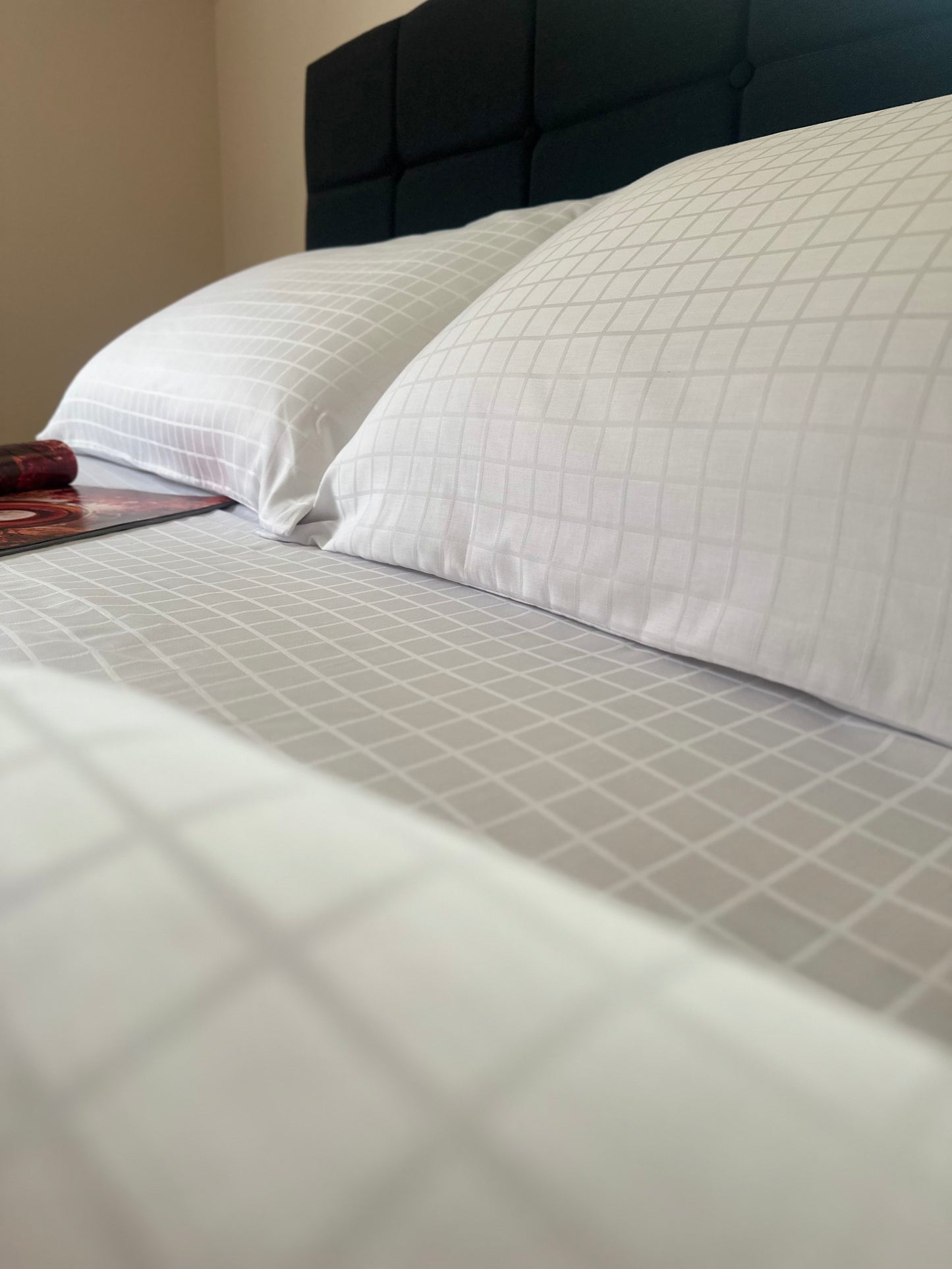 Close-up of smooth and shiny sateen jacquard bed sheet