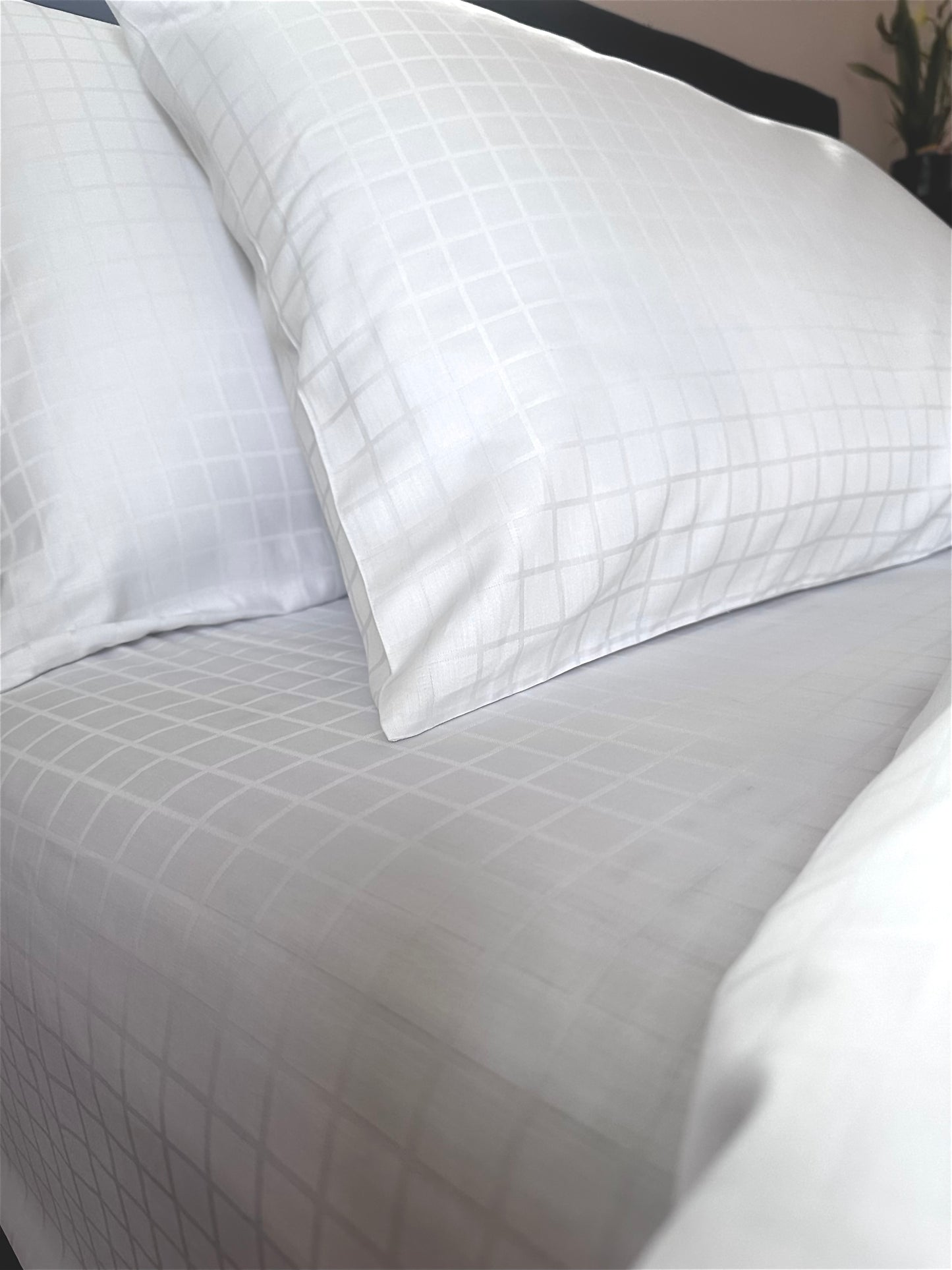 Close-up of smooth and shiny sateen jacquard bed sheet