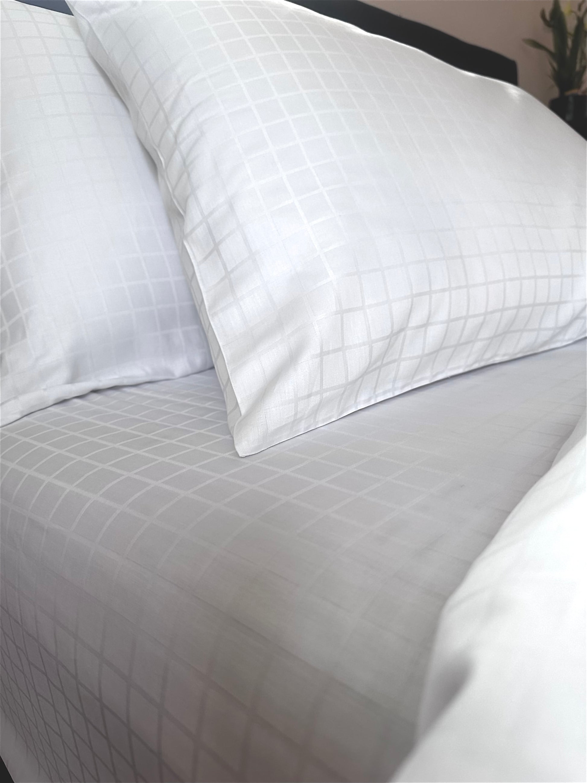 Close-up of smooth and shiny sateen jacquard bed sheet