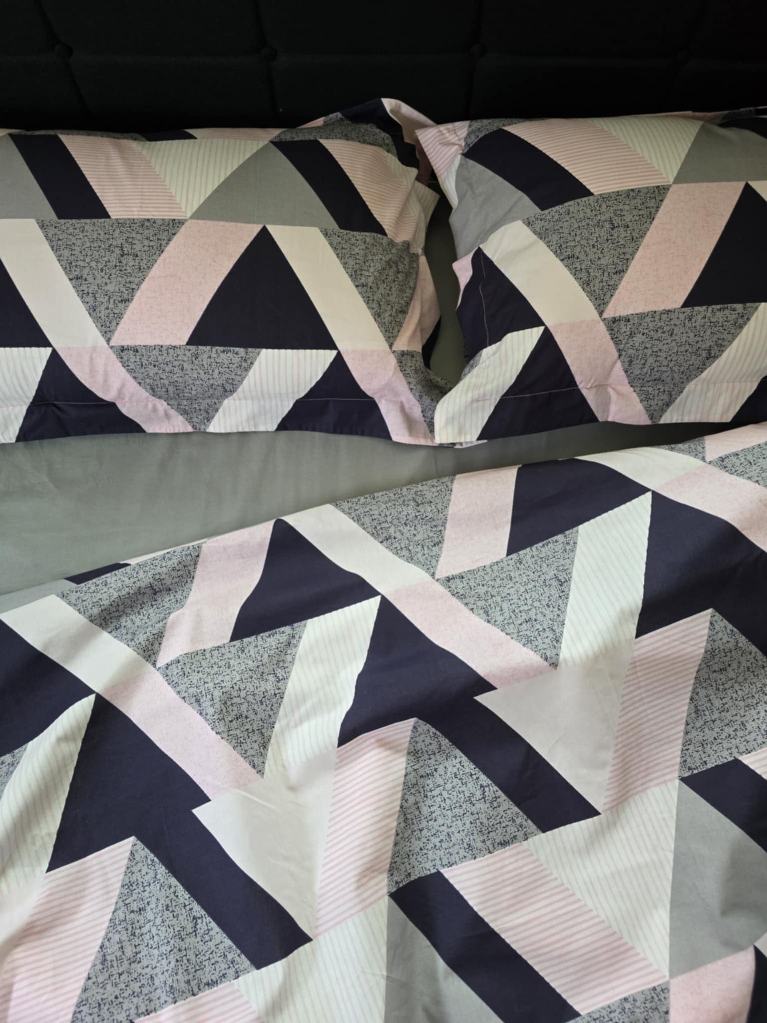 Modern geometric pattern bedding in shades of grey and white