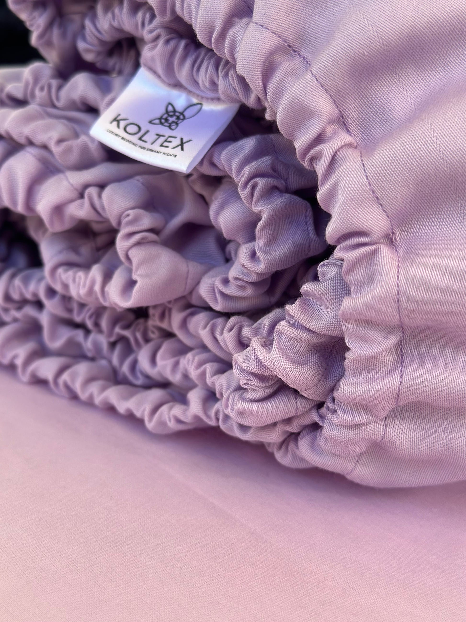 Close-up of silky floral patterned bedding fabric