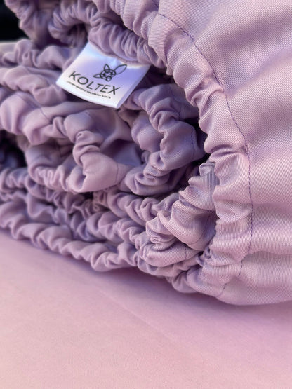 Close-up of silky floral patterned bedding fabric