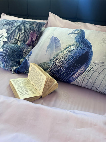 Peacocks floral sateen bedding styled on bed — soft, elegant, premium cotton set.