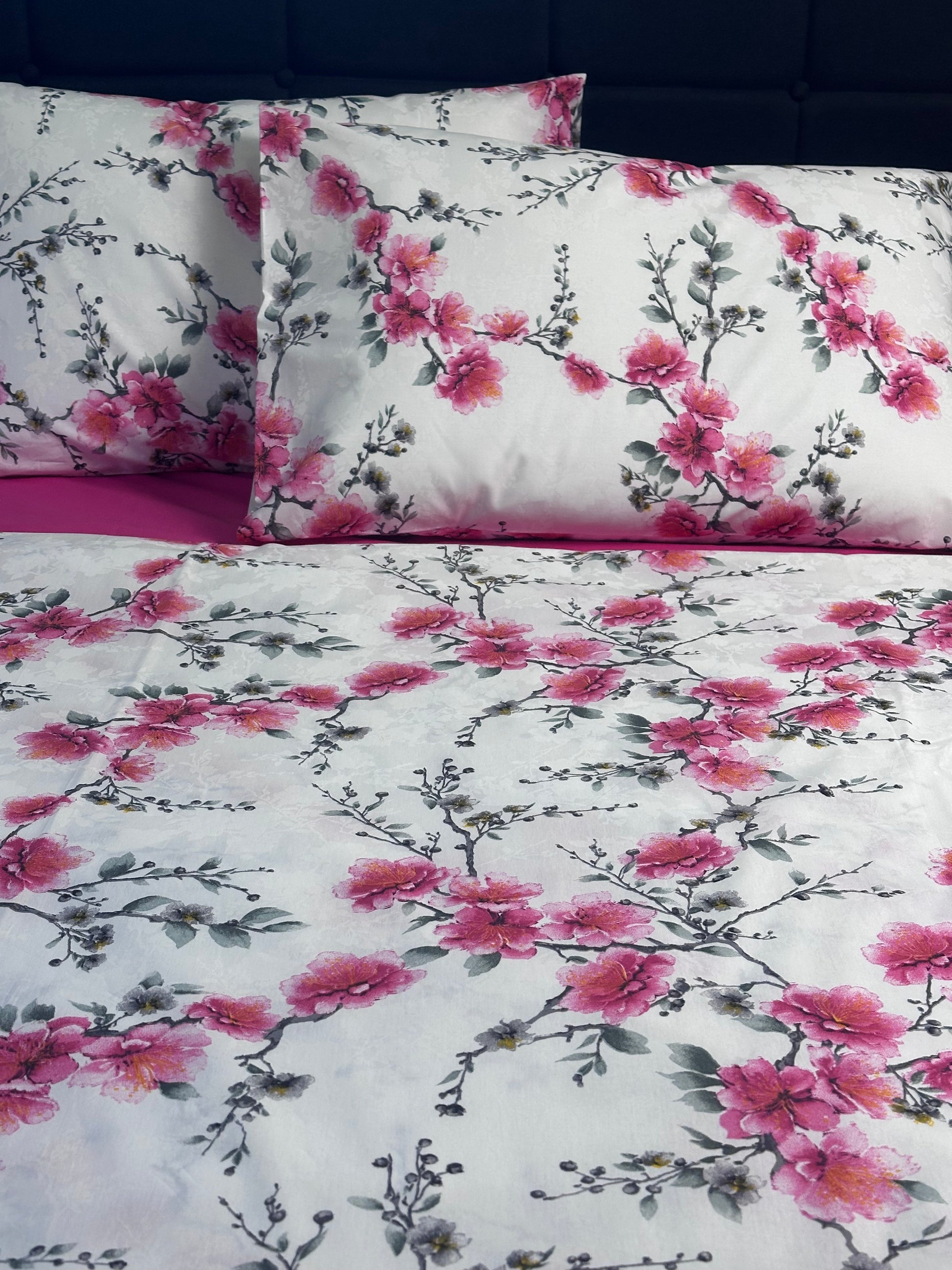 Cherry blossom duvet with bright pink fitted sheet