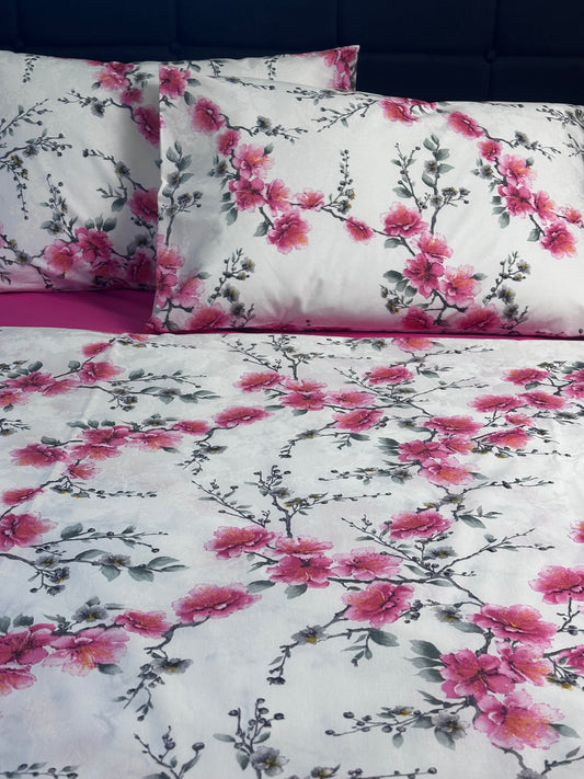 Cherry blossom duvet with bright pink fitted sheet