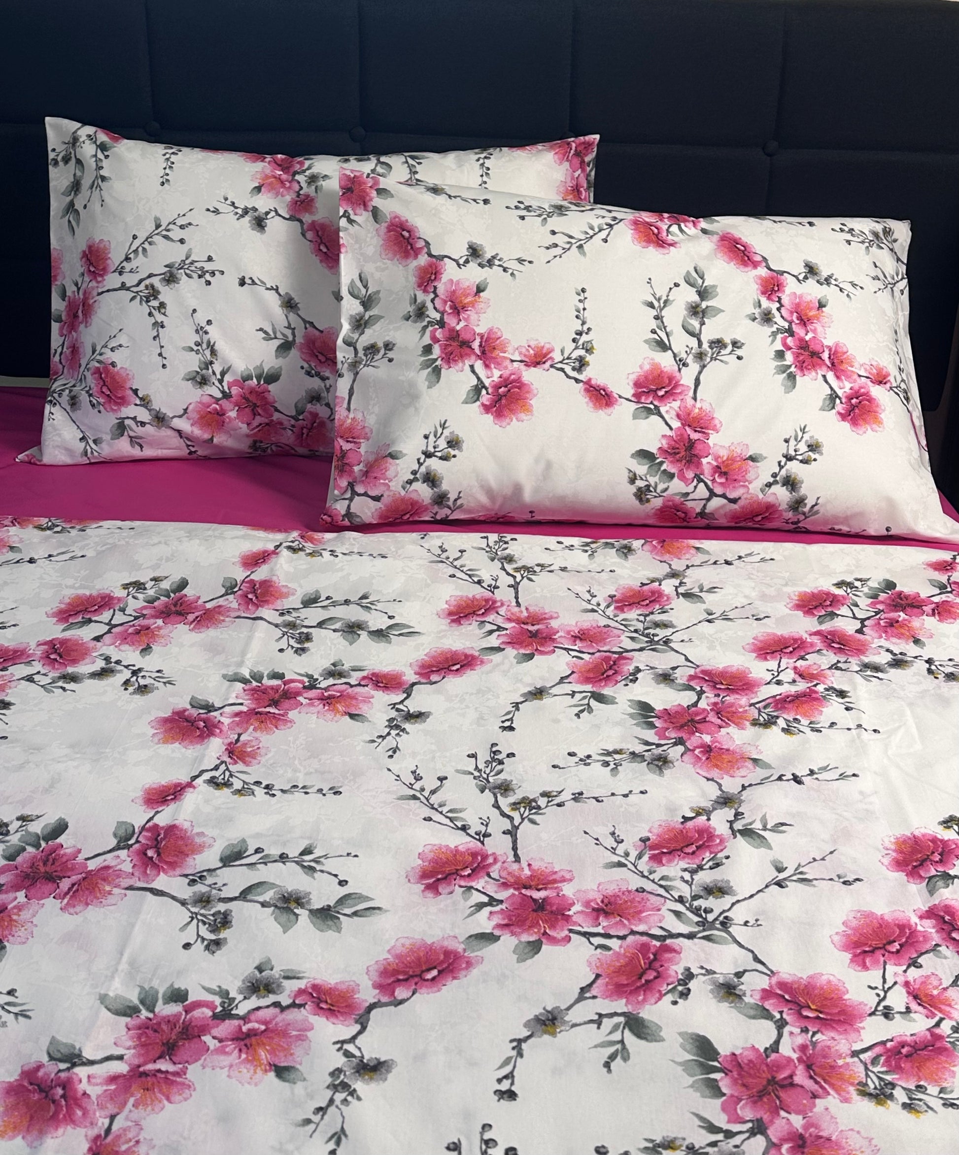 Bold and romantic bedding with deep pink fitted sheet