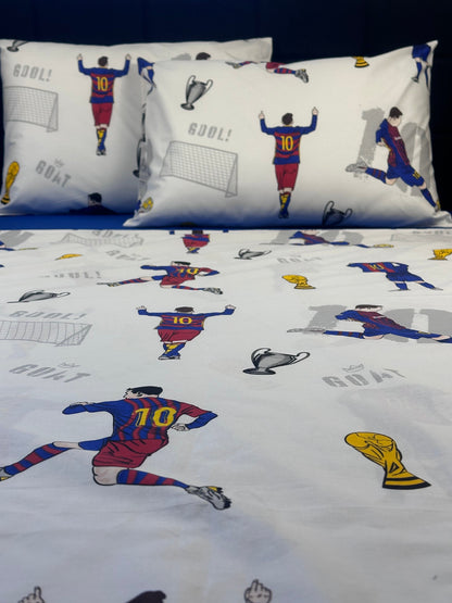 Number 10 football-themed kids bedding set styled on bed — cotton duvet cover and pillowcases.