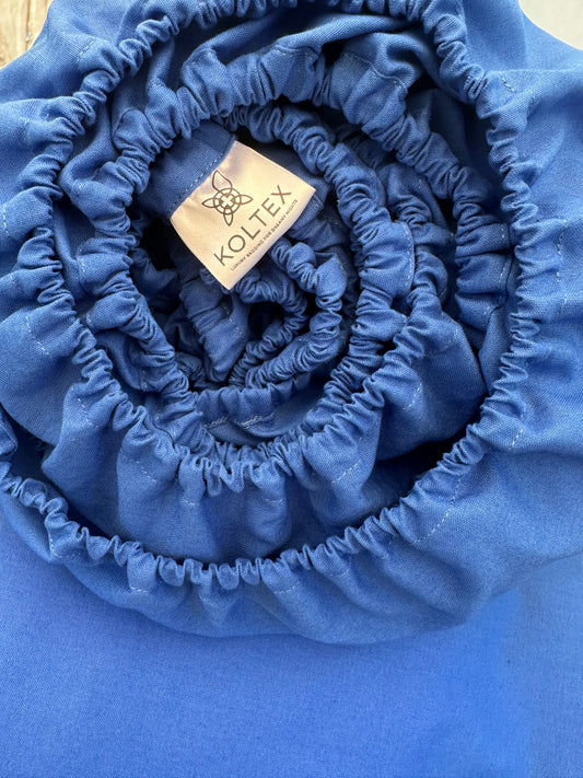 Royal blue fitted sheet rolled with elastic edge