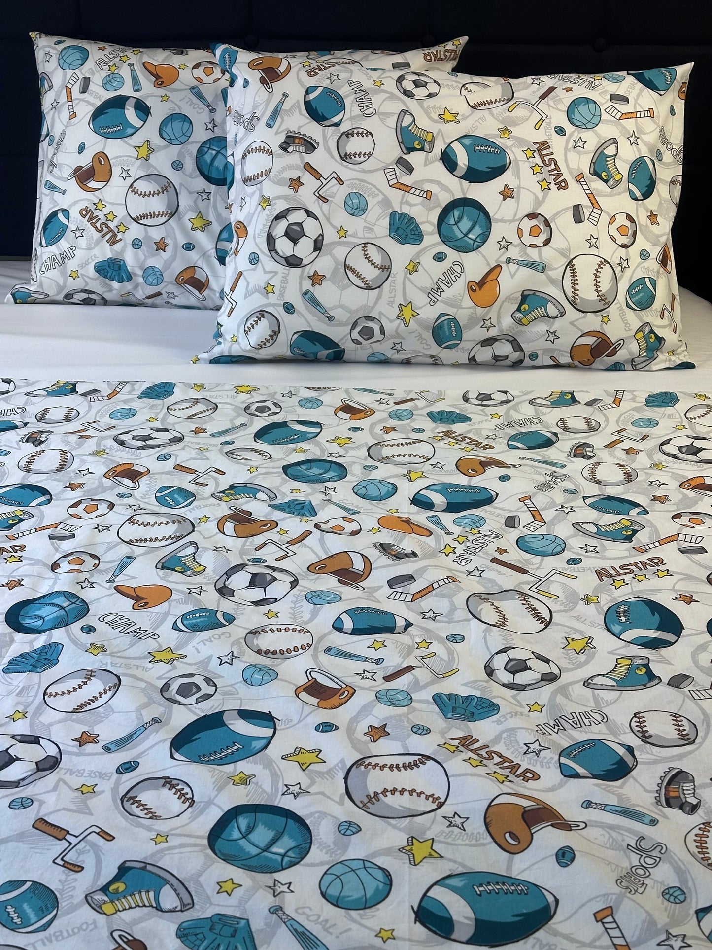 Sports bedding set for kids featuring colorful athletic ball design