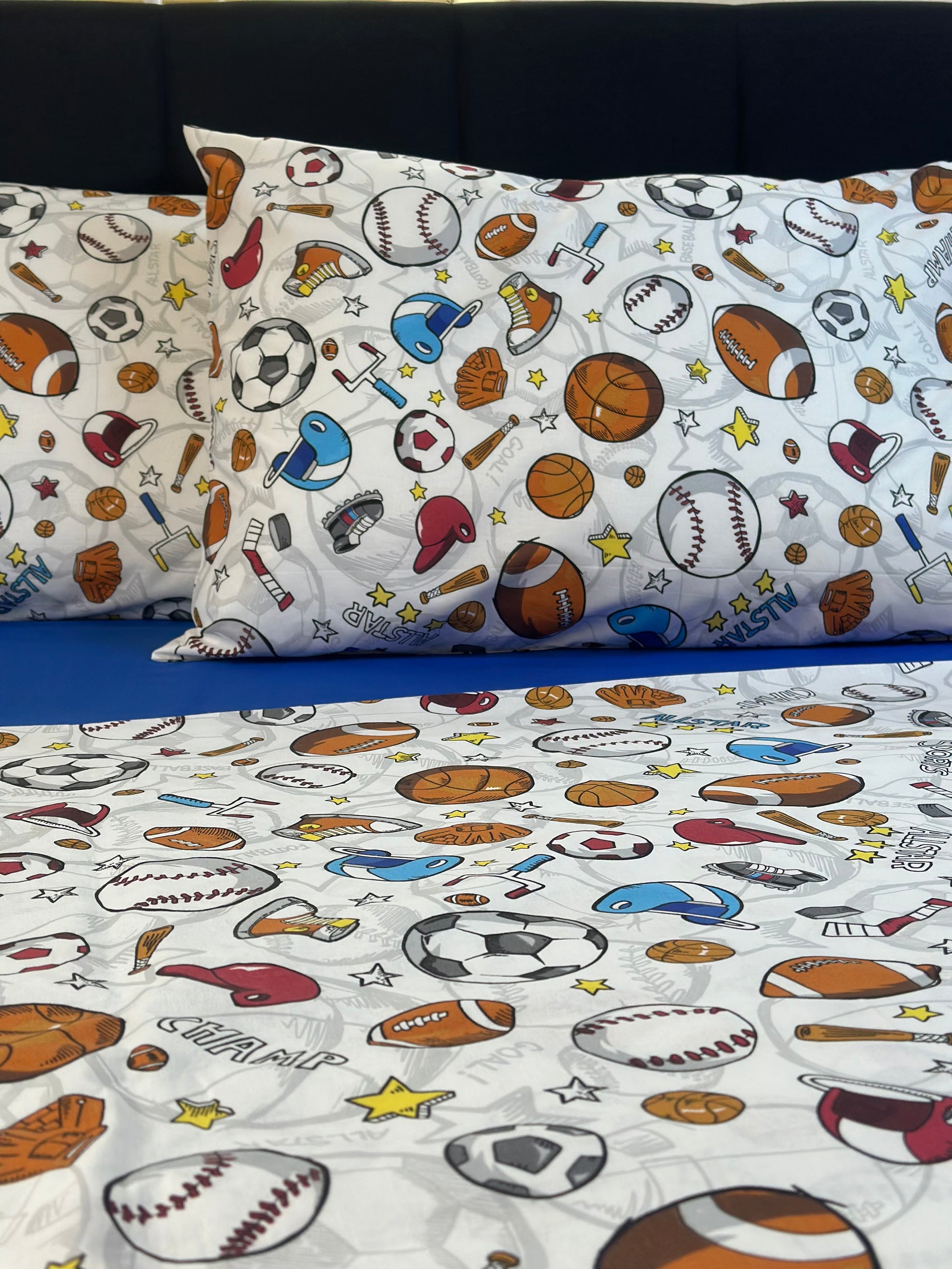 Athletic themed pillowcases with baseball, hockey, and basketball graphics