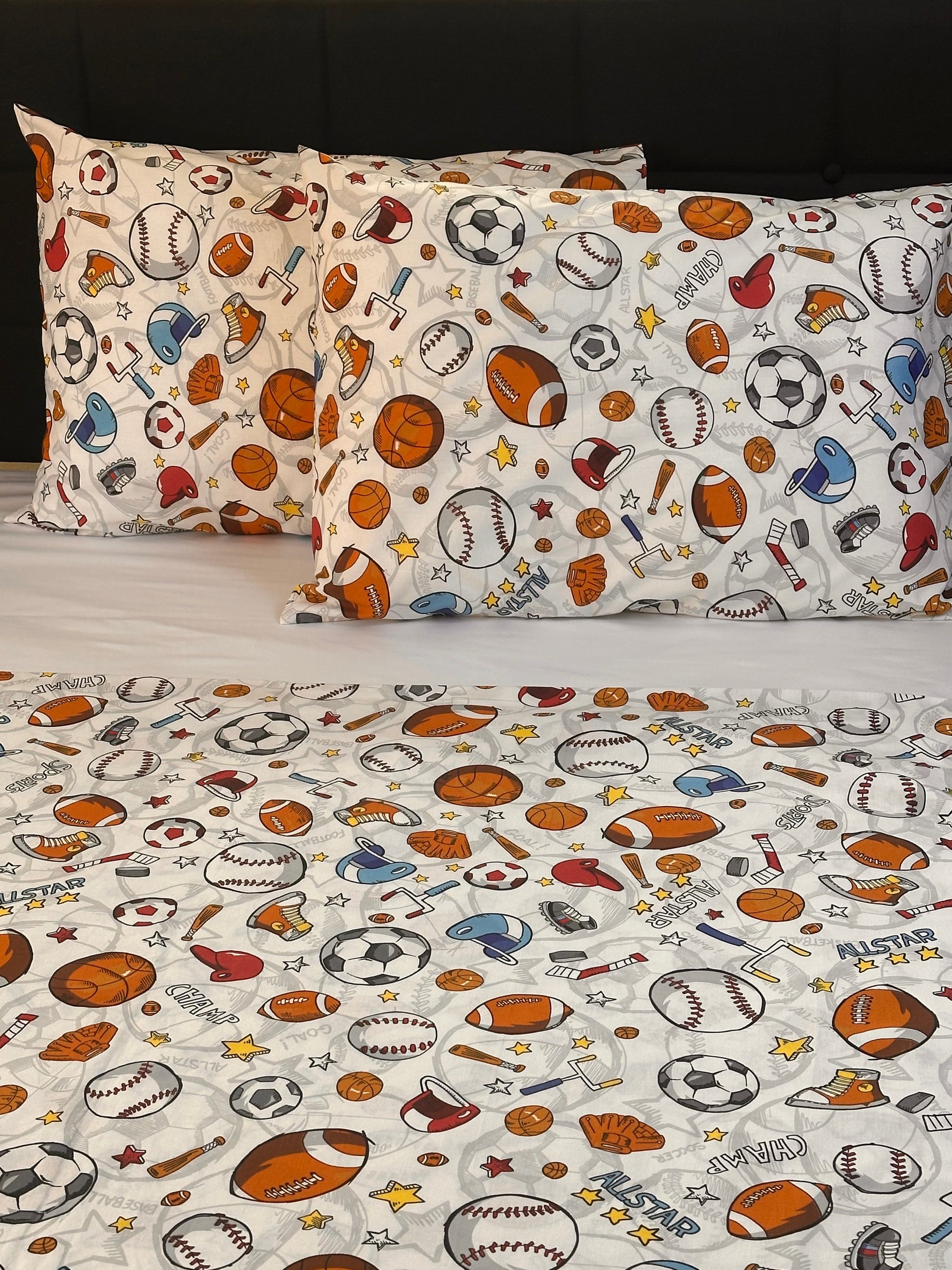 Curtains with sports-themed pattern on a white background