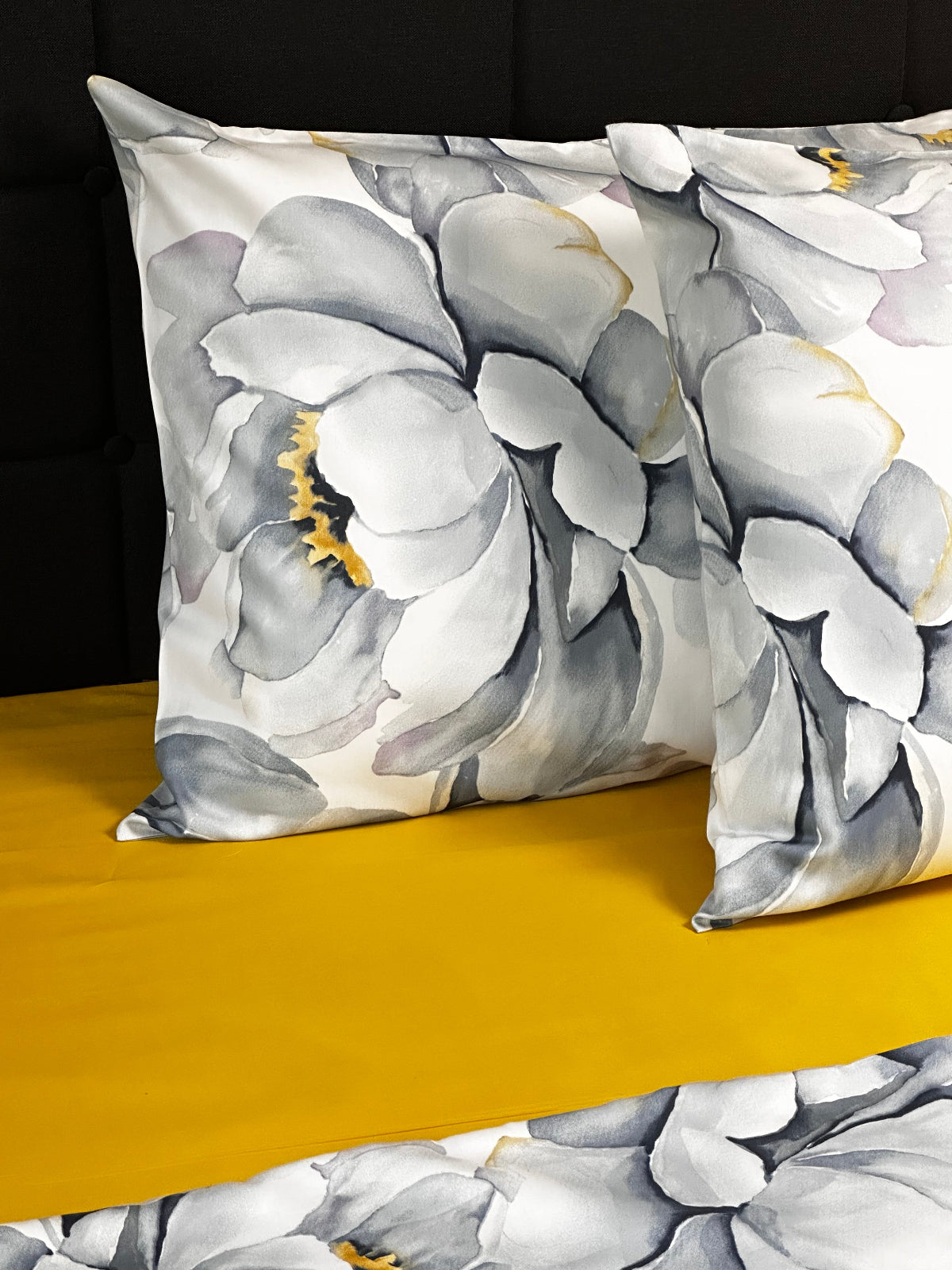 Gray floral duvet cover with matching pillowcases, delicate watercolor peony design for bedroom decor.