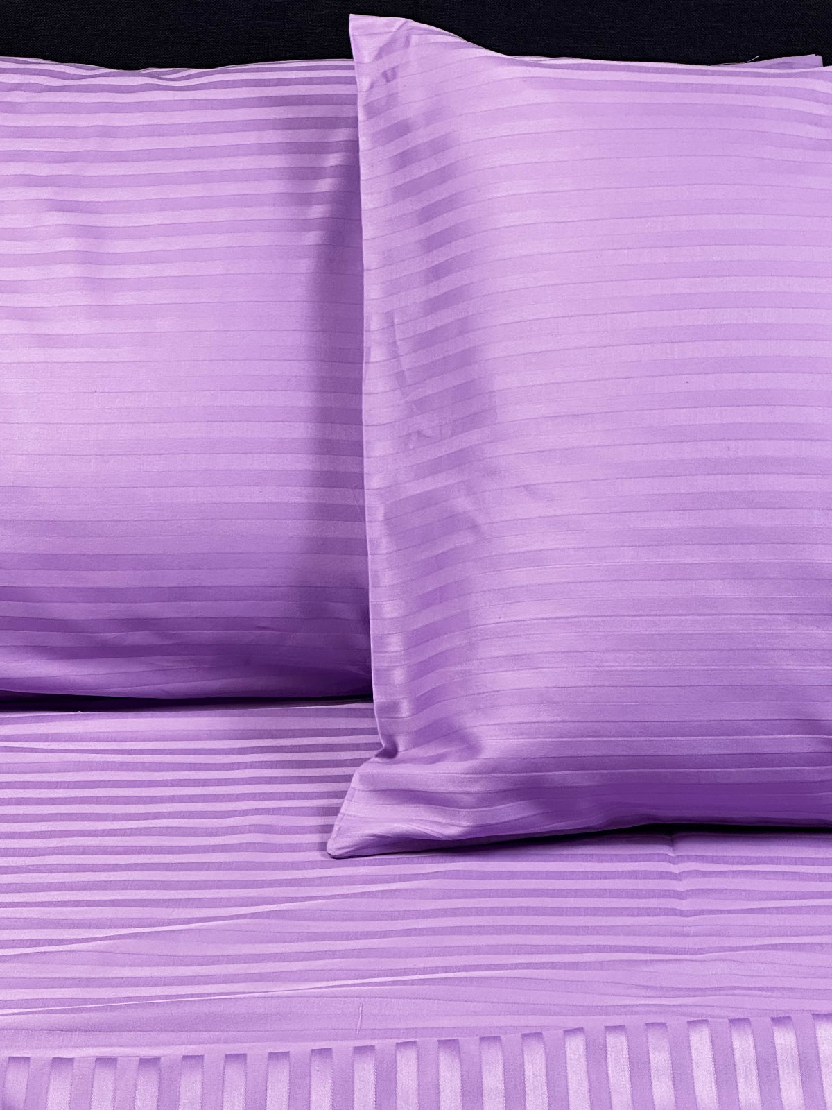 Lavender stripe sateen pillowcase detail – envelope closure and satin-like finish