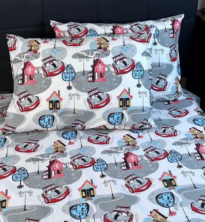 Bright kids pillowcase with racing car design — natural cotton, gentle on sensitive skin