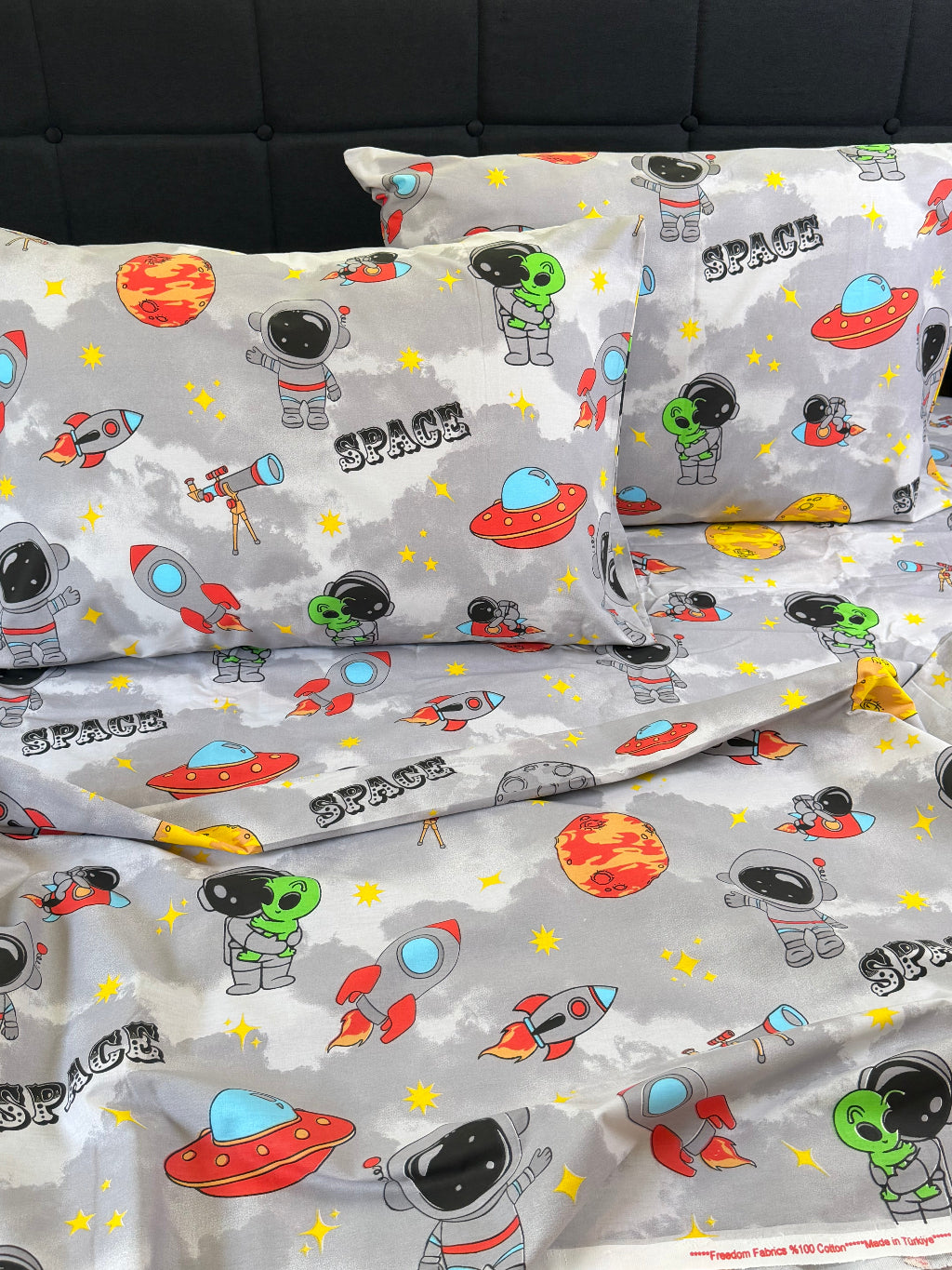 Kids Cosmic Bedding Set in blue space design with rockets and planets — soft organic cotton