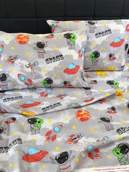 Kids Cosmic Bedding Set in blue space design with rockets and planets — soft organic cotton