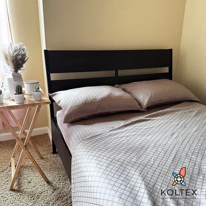 High-quality cotton bedding displayed on a modern bed