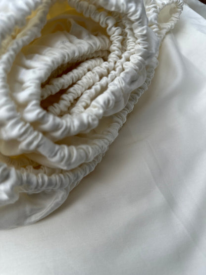 Ivory Sateen Fitted Sheet made from 100% Turkish cotton — silky, breathable and OEKO‑TEX certified