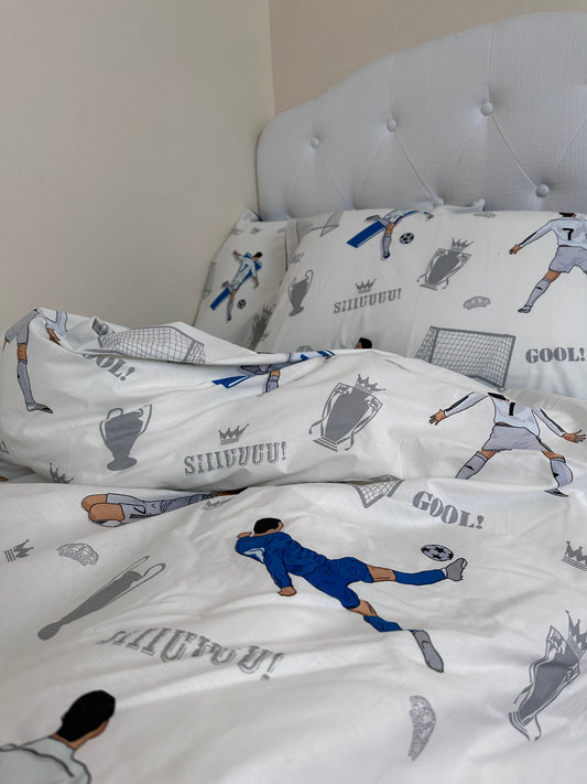 Football player graphic on blue pillowcase for boys’ sports room bedding décor