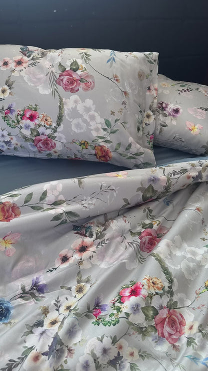 Romantic bedroom look with floral printed sateen bedding